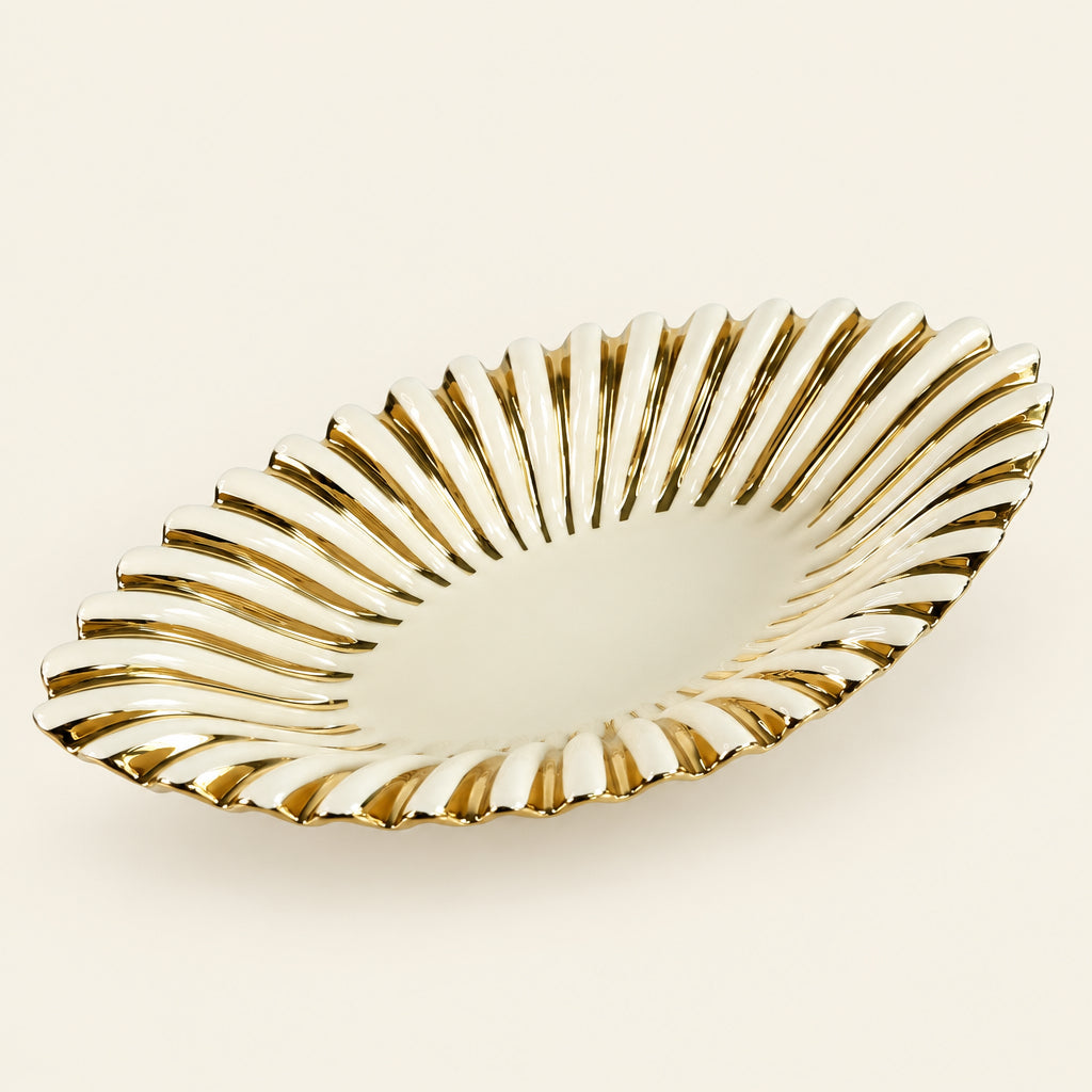 Gold Ray 17-inch boat-shaped porcelain bowl with fluted gold sides, used as a centrepiece or fruit bowl
