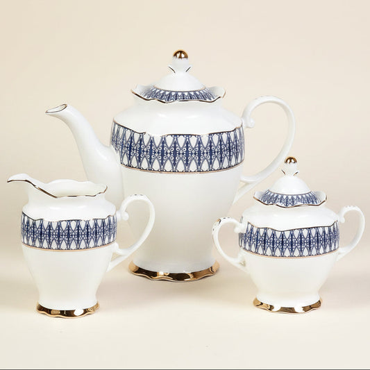Royal Blue porcelain teapot with a rose motif and a gold rim