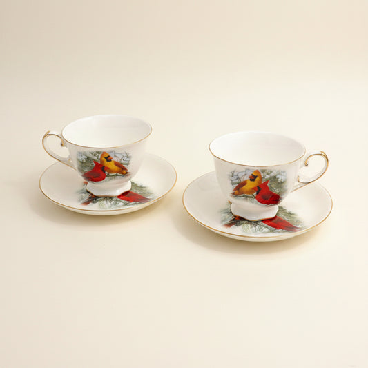 Cardinal porcelain cup and saucer pair painted with cardinal birds, 325 mL