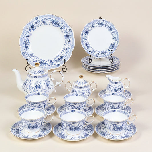 Blue Flower 24-piece porcelain tea set for six with gold trim, teapot, cups, saucers and cake plates
