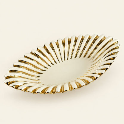 Gold Ray 17 inch boat-shaped porcelain bowl with fluted gold sides, part of the dessert table set