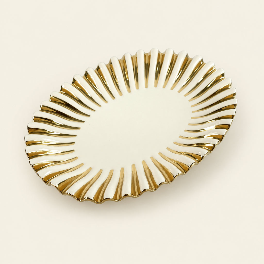 Gold Ray 15-inch oval porcelain serving platter with a fluted gold rim
