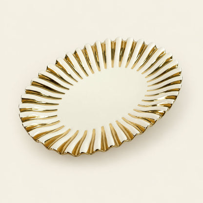 Gold Ray 15 inch oval porcelain tray with a fluted gold rim, part of the dinner party set