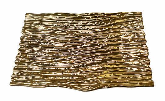 Wavy gold serving tray with a rippled rim